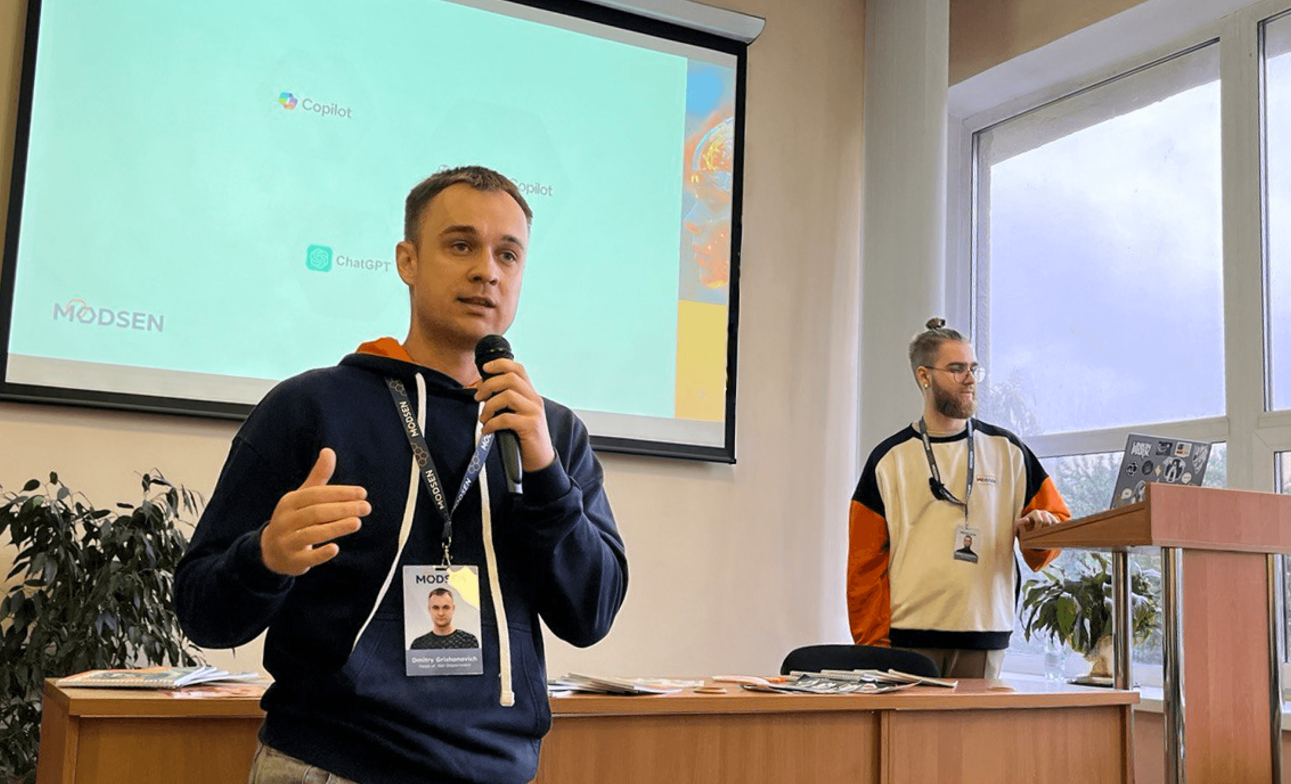 Engineers speak in front of an audience Engineers speak in front of an audience